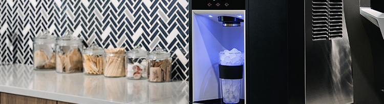 Break room with Champion dispenser on counter