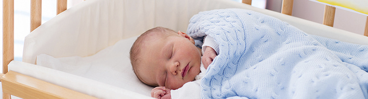 Baby in crib